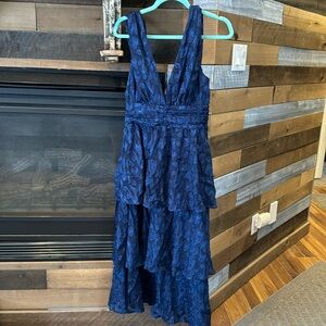 Beautiful Navy tiered dress. New with tags. Ordered. Did not work for my event.